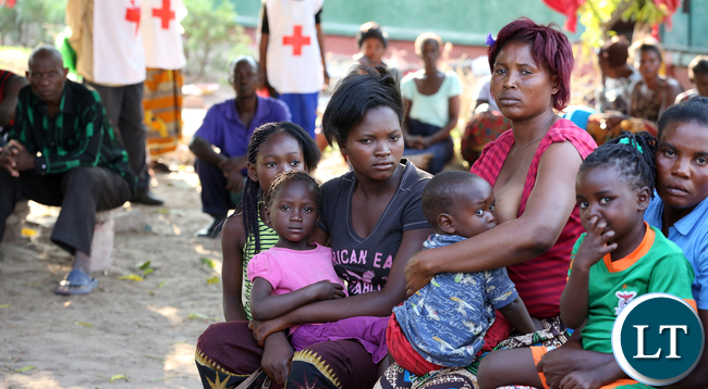 Redcross at Namwala looking after Victims camped at Secondary School.
