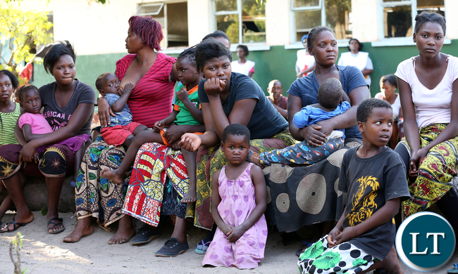 Redcross at Namwala looking after Victims camped at Secondary School.