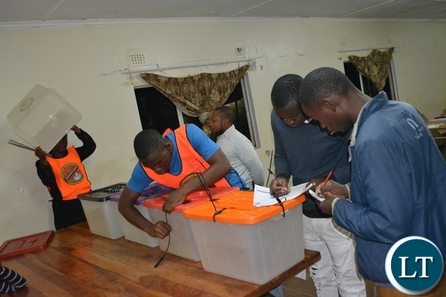 Electoral officers, agents and monitors inspecting the Ballot Boxes at Rainbow Africa polling station in Livingstone yesterday shortly before the opening of the Polls yesterday. Picture by BRIAN HATYOKA Electoral officers, agents and monitors inspecting the Ballot Boxes at Rainbow Africa polling station in Livingstone yesterday shortly before the opening of the Polls yesterday. Picture by BRIAN HATYOKA