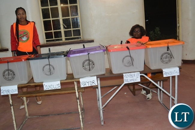 Livingstone Constituency assistant returning officer Choolwe Maunga Lipenga (left) shortly before the opening of the Polls at Victoria Hall polling station yesterday. Picture by BRIAN HATYOKA Livingstone Constituency assistant returning officer Choolwe Maunga Lipenga (left) shortly before the opening of the Polls at Victoria Hall polling station yesterday. Picture by BRIAN HATYOKA
