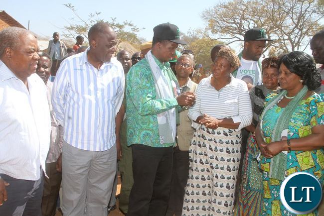 President Lungu talks to Paramount Chief Kalonga Gawa Undi's mother as First Lady Esther Lungu ,Former president Rupiah Banda and MMD president Felix Mutate listens after paying a Courtesy call on the Paramount Chief at Mkaika Palace in Katete on Friday, August 5,2016 -Picture by THOMAS NSAMA