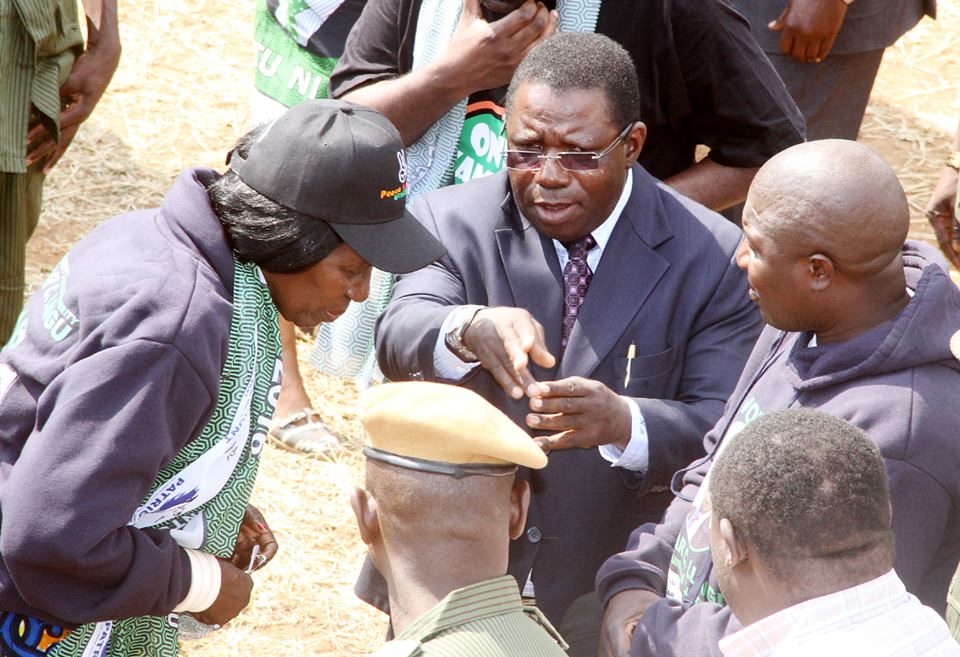 Vice-President Inonge Wina (l) listens to PF Campaign manager Samuel Mukupa on arrival at Woodlands Stadium for the Thanks Giving and Unity Rally in Lusaka on Tuesday, August 16,2016-Picture by THOMAS NSAMA