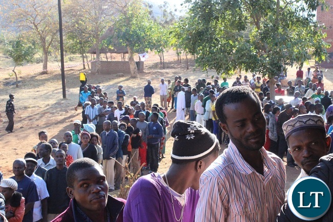 VOTERS voting at Mary Mother of God Parish in Chipata Central yesterday. Picture By JULIUS PHIRI
