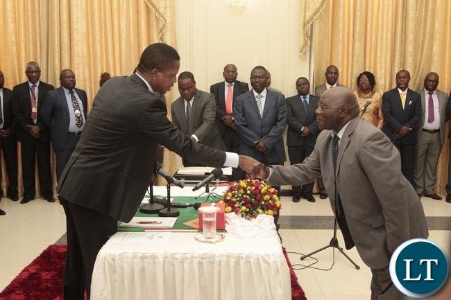 President Edgar Lungu congratulates Newly appointed Minister of General Education Dennis Wachinga during swearing in ceremony at State House President Edgar Lungu congratulates Newly appointed Minister of General Education Dennis Wachinga during swearing in ceremony at State House