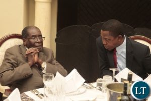 President Edgar Lungu with President Robert Mugabe at State House
