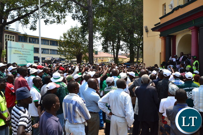 Copperbelt Minister Bowman Lusambo addresses an impromtu crowd of his supporters that converged outside the Provicial Administration Buildings to welcome him after he reported for duty