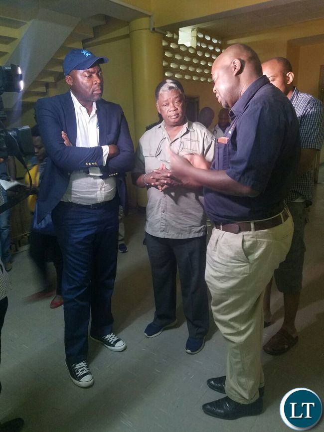 Dr Jonathan Mwansa briefing Copperbelt Minister Bowman Lusambo during his tour of the hospital