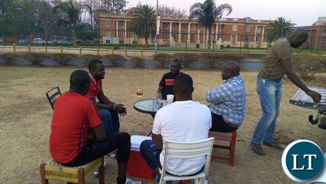 Max, Kennedy Kamba and other PF cadres enjoying their beer outside the Supreme Court