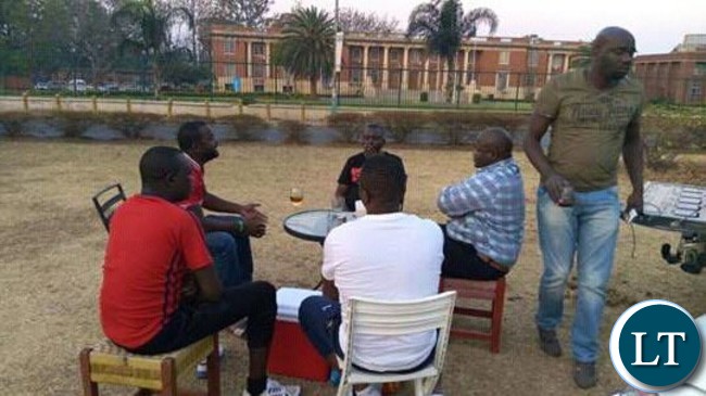 PF cadres drinking outside the Supreme Court