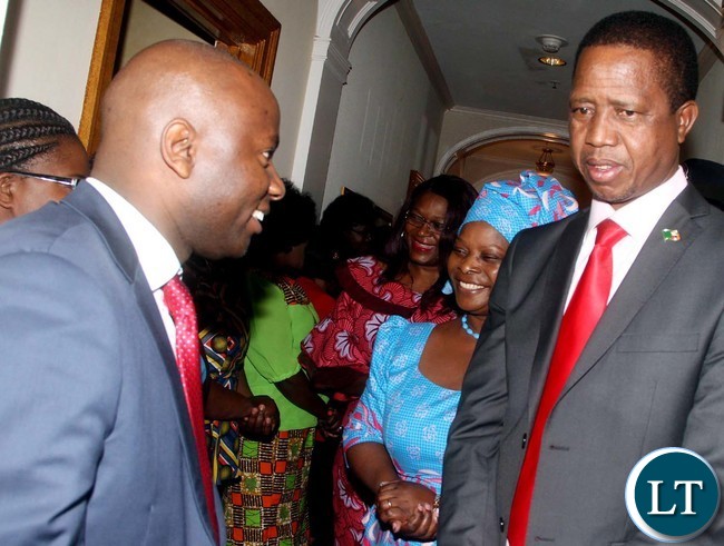 President Lungu and First Lady Esther Lungu listens to Permanent Mission of Zambia to the United Nations First Secretary for Press Chibaula Silwamba on arrival in New York for the 71st UN General Assembly on Friday, September 16,2016-Picture by THOMAS NSAMA