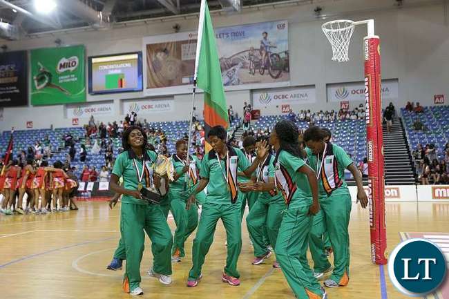 The triumphant Zambia team strutting their stuff on court after capturing the Nations Cup. They beat Papua New Guinea 65-49.PHOTO: TIFFANY GOH FOR THE SUNDAY TIMES The triumphant Zambia team strutting their stuff on court after capturing the Nations Cup. They beat Papua New Guinea 65-49.PHOTO: TIFFANY GOH FOR THE SUNDAY TIMES