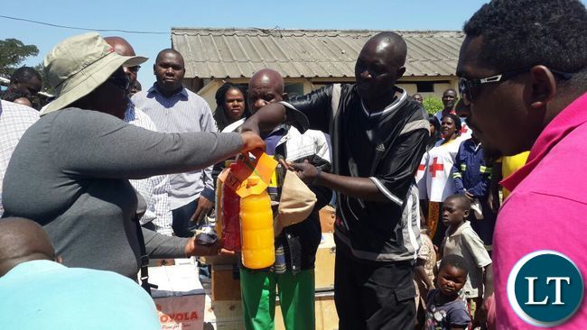 Some of the receipients receiving the donated items