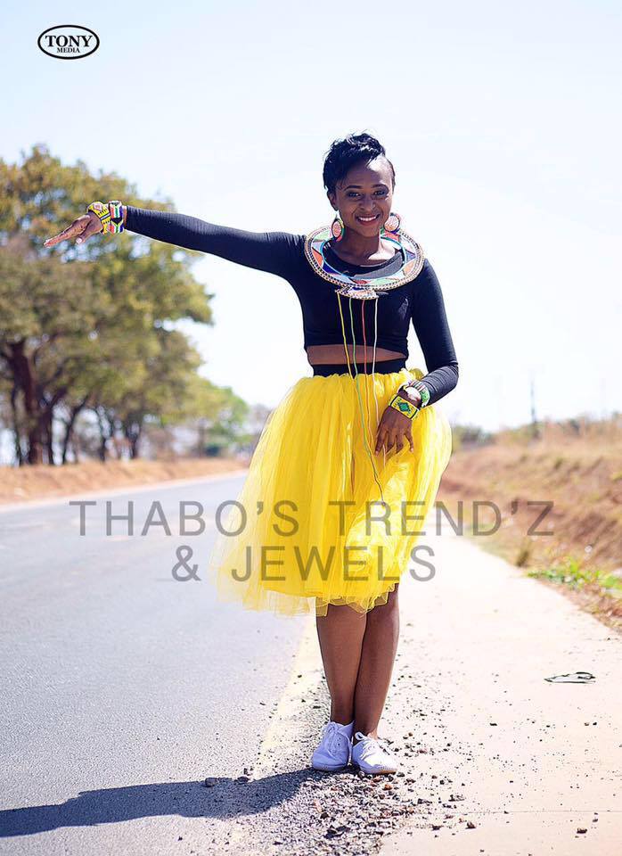 Thabo wearing her designs
