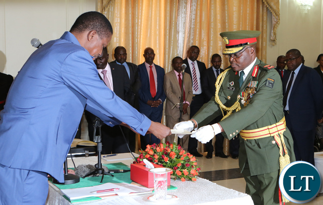 President Edgar Lungu Talks to Major General Jackson Phiri Zambia army deputy Commander after the Swearing in Ceremony at State house