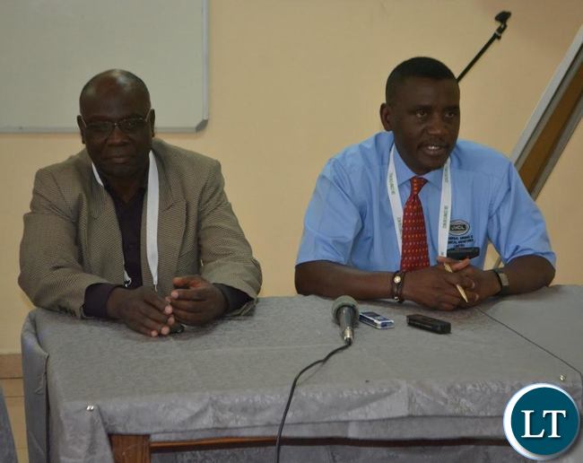 Universal Mining and Chemical Industries Limited (UMCIL) executive technical director Julius Kaoma (left) flanked by company sales manager Benjamin Belemu (right) during a media briefing in Livingstone. This was at the end of the three-day International Conference on Infrastructure Development and Investment Strategies for Africa