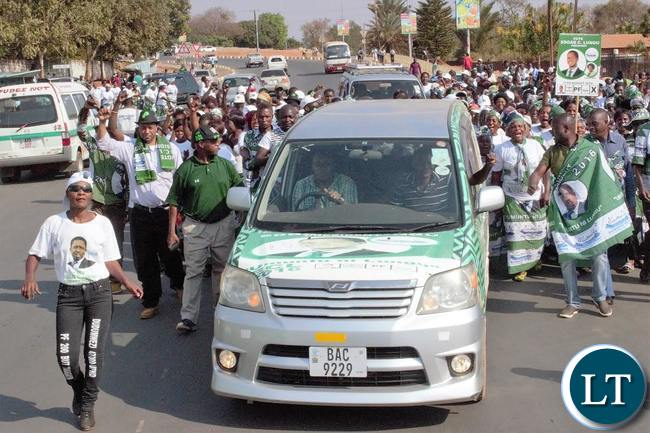 PATRIOTIC Front (PF) members marching along the famous Umodzi highway in solidarity with President-Elect Edgar Lungu in Chipata