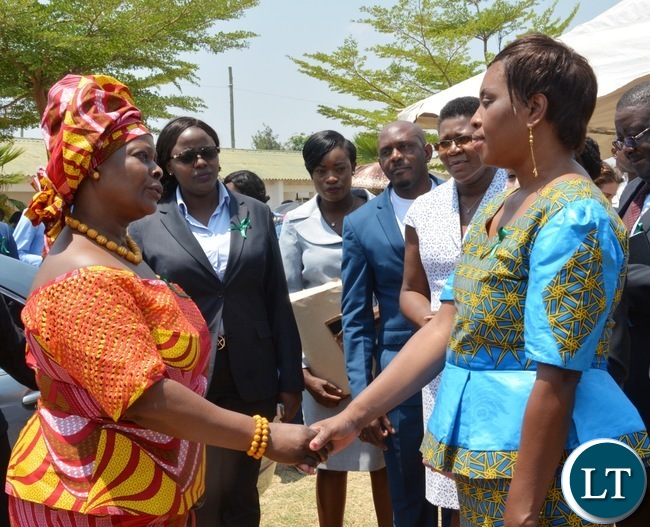 First Lady Esther Lungu(l) with North mead Primary School Headmistress Sylvia Mulyata(r) during Giacomo Global Hand Washing Day at North mead Primary Schoo