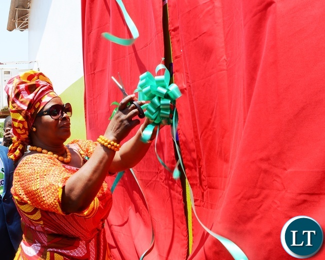 First Lady Esther Lungu cuts the ribbon to officially open the Esther Lungu Administration Block at North mead Primary School during the Giacomo Global Hand Washing Day