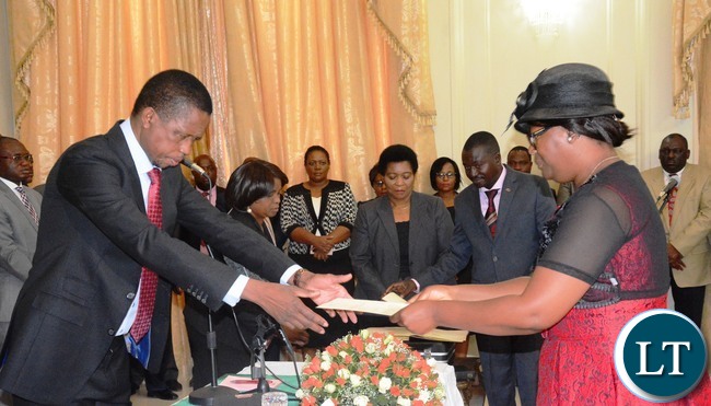 President Edgar Lungu(l) swears in Sylvia Chalikosa as Minister in the Office of the Vice President at State House