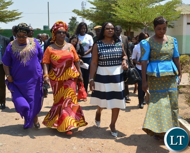 First Lady Esther Lungu(second left), Second Former First Lady Vera Tembo Chiluba(l) ,Third Former First Lady Maureen Mwanawasa(second right) and North mead Primary School Headmistress Sylvia Mulyata(r) during Giacomo Global Hand Washing Day at North mead Primary School