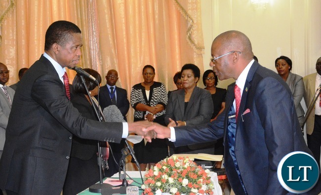 President Edgar Lungu(l) swears in Matthew Nkhuwa as Minister of Works and Supply during the Swearing in Ceremony at State House President Edgar Lungu(l) swears in Matthew Nkhuwa as Minister of Works and Supply during the Swearing in Ceremony at State House