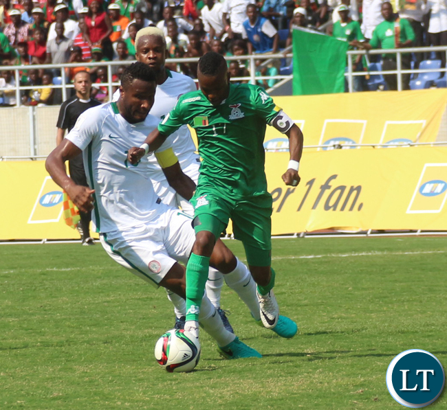 Rainford Kalaba and Mikel John Obi fight for the ball