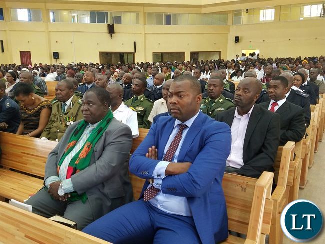 Listening to a sermon during the commemoration of the National Day of Prayer and Fasting at the New Apostolic Church in Kansenshi, Ndola