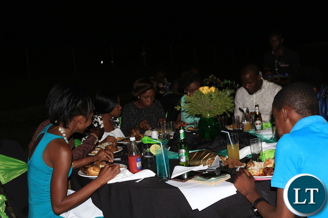 Some members of the media enjoying their dinner