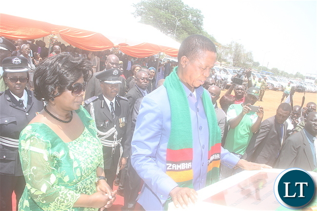 First Lady Esther Lungu with President Lungu laying the Foundation to begin the Construction of the House of Player at Woodlands Forest reserve area on Tuesday, October 18,2016. This was during the National Day of player, Fasting, repentance and Reconciliation -Pictures by THOMAS NSAMA First Lady Esther Lungu with President Lungu laying the Foundation to begin the Construction of the House of Player at Woodlands Forest reserve area on Tuesday, October 18,2016. This was during the National Day of player, Fasting, repentance and Reconciliation -Pictures by THOMAS NSAMA
