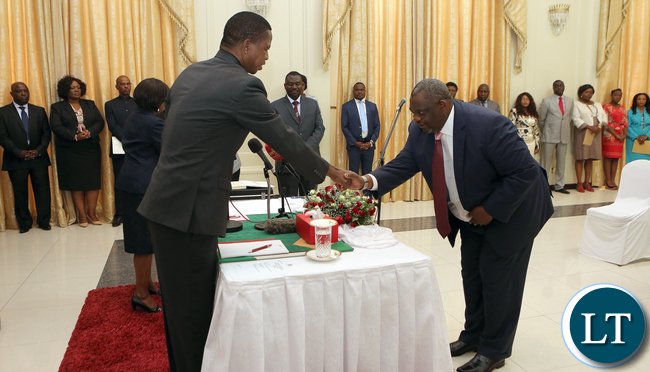 President Edgar Lungu Greets Mr Amos Mwila Musonda Chiarperson Local Government Service Commission