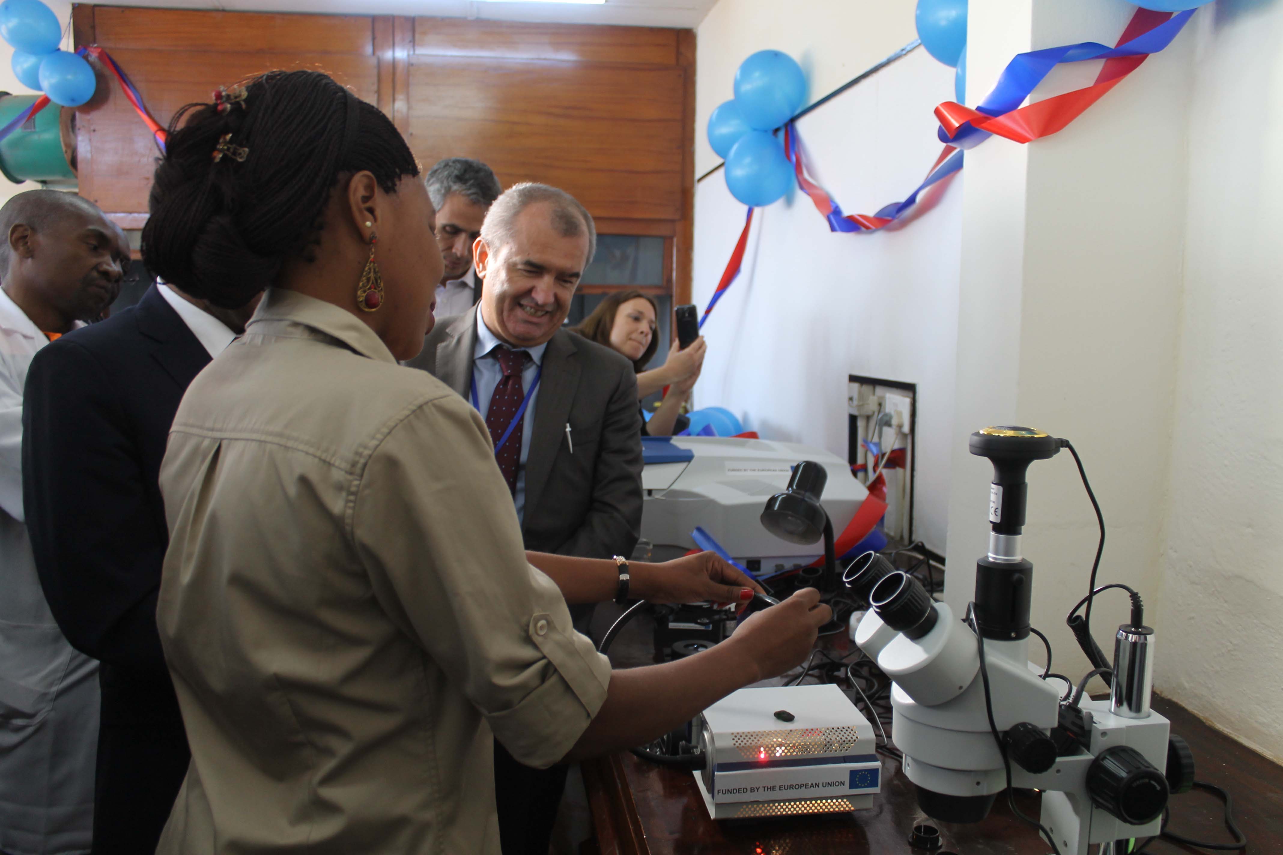 Senior Gemologist Michelle Naambo demonstrates using the new mineral production monitoring equipment after the unveiling at Geological Survey Department on the 5th October