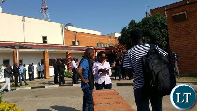 ZNBC workers chatting outside their offices
