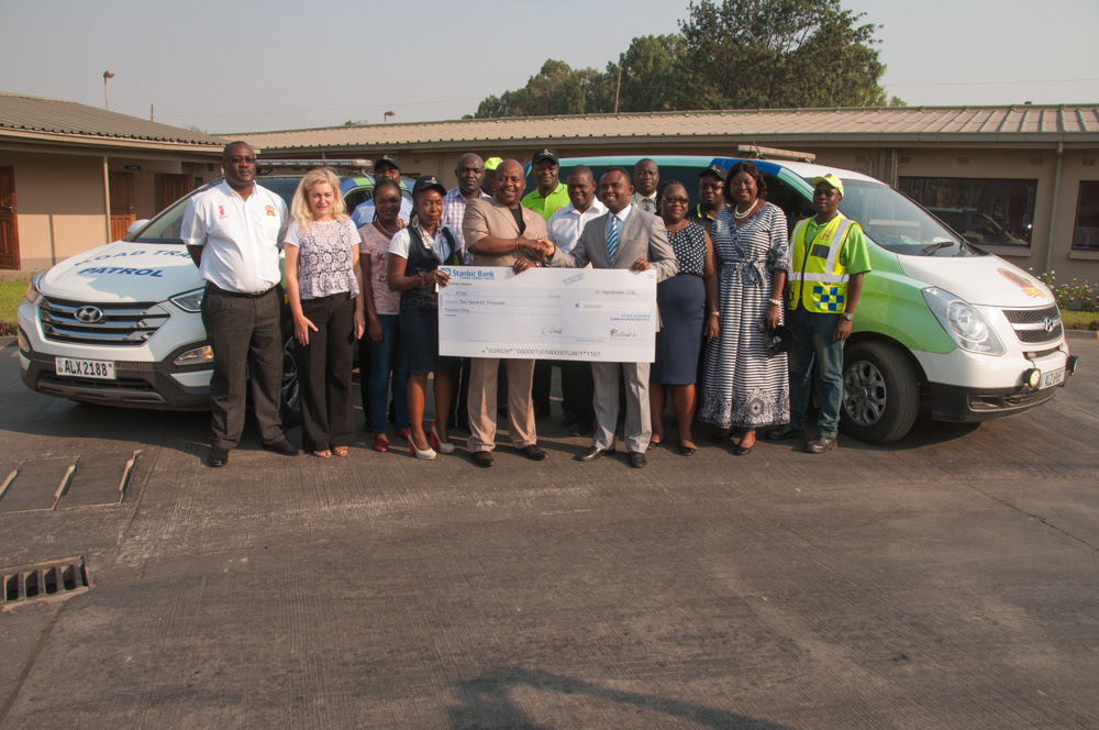 Zambian Breweries and RTSA representatives mark their partnership on road safety.