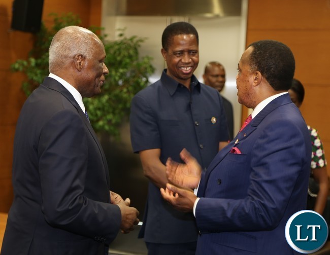 Congo Brazavil President Denis Sassou Ngwesso talks to Angolan President Eduardo dos antos while President Lungu listerns during the grate lakes summit in Luanda Angola 26-10-2016.