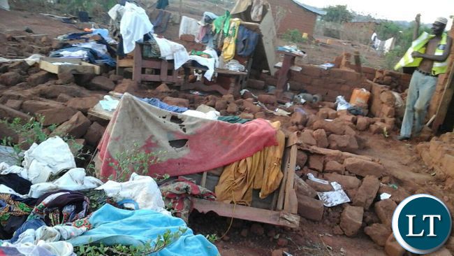 Remains of a house damaged by a recent rainstorm in Ndola