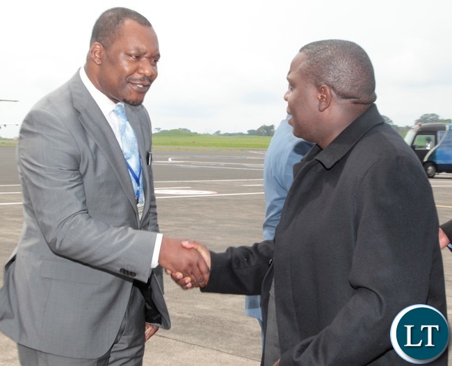 Foreign Affairs Minister ,Hon Harry Kalaba is welcomed by of Equatorial Guinea foreign Affairs Director Pendro Nguma at Malabo International Airport t