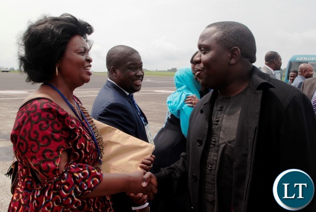 Foreign Affairs Minister ,Hon Harry Kalaba is welcomed by Zambia's permanent Ambassador to the African Union Susan Sikaneta at Malambo International Airport.