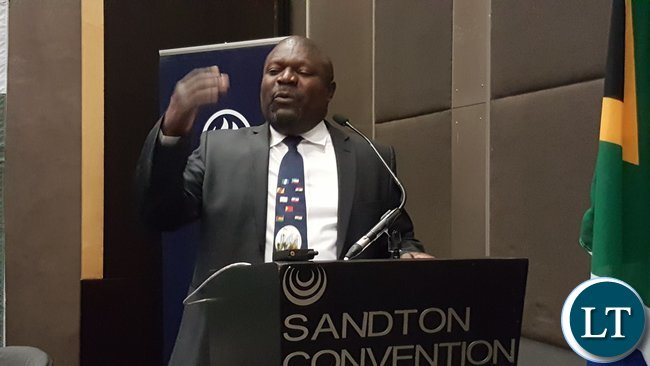 Minister for National Development Planning, Mr. Lucky Mulusa speaking when he delivered the keynote address at the opening of the 'Invest in Zambia Business Forum' at Sandton Convention Centre in Johannesburg Minister for National Development Planning, Mr. Lucky Mulusa speaking when he delivered the keynote address at the opening of the 'Invest in Zambia Business Forum' at Sandton Convention Centre in Johannesburg