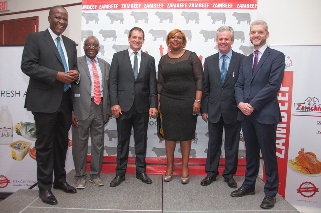 Agriculture Minister Hon. Dora Siliya and Finance Minister Hon. Felix Mutati celebrate Zambeef's raising of US$65 miliion in capital from CDC group with Zambeef chairman Dr Jacob Mwanza, second left, Joint Chief Executive Officers carl Irwin, third left, and Francis Grogan, second right, and CDC Managing Director, Equity Investments, Mark Pay, right.