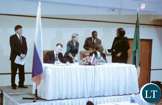 Zambian Govt officials signing documents with Russia's Rosatom for development of nucear technology in Zambia