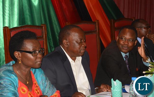 Chairperson of the Nation Assembly Christopher Kalila franked with Secretary General of Southern African Development Community Esau Chiviya (C) with United Nation Fund for Population Actives (UNFPA)Country Director Mary Otieno during the Orientation Workshop on the Sexual and reproductive health and Rights at Parliament Buildings