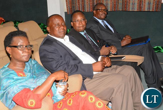 United Nation Fund for Population Actives (UNFPA)Country Director Mary Otieno(r) Secretary General of Southern African Development Community Esau Chiviya second to the right Chairperson of the Nation Assembly Christopher Kalila second to the Lift with Deputy Clerk Procedures Roy Ngulube he Orientation Workshop on the Sexual and Reproductive Health and Rights , at Parliament Buildings