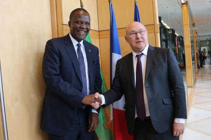 Zambia´s Finance Minister Felix Mutati and France´s Minister of Finance, Michel Sapin, at the Ministry of Finance - Paris - France.