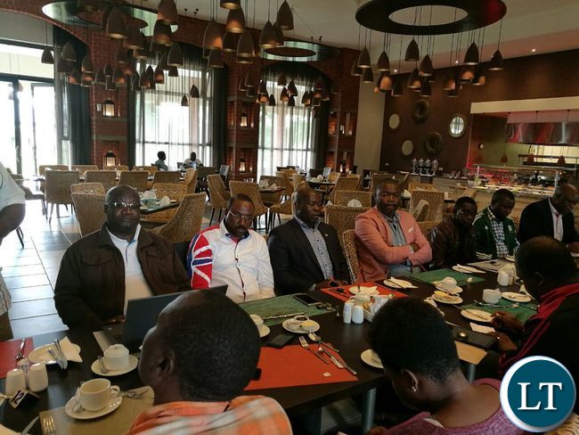 Kafubu MP Bowman Lusambo listens in during the news conference
