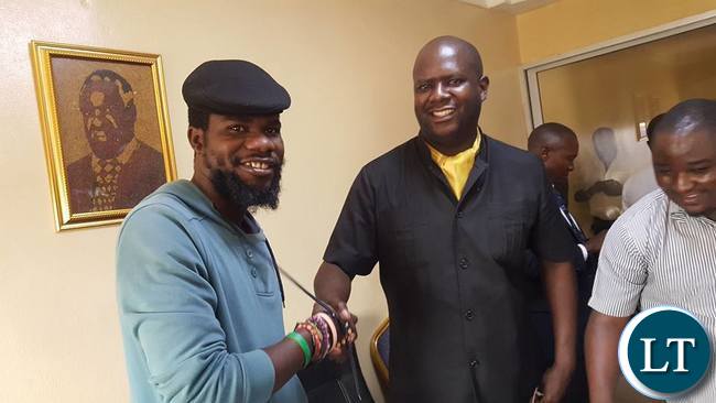 Pilato shakes hand with former Lusaka Mayor Daniel Chisenga