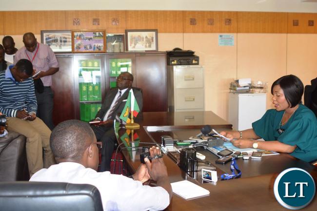 Minister of Information and Broadcasting Services Kampamba Mulenga(l) speaking to the Media on the Implementation of the Digital Migration Project and Establishment of the joint Ventures and the dispel of the insinuation that Government has given ZNBC to a Chinese Company.