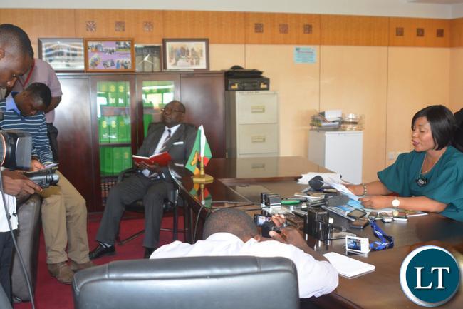 Minister of Information and Broadcasting Services Kampamba Mulenga(l) speaking to the Media on the Implementation of the Digital Migration Project and Establishment of the joint Ventures and the dispel of the insinuation that Government has given ZNBC to a Chinese Company.