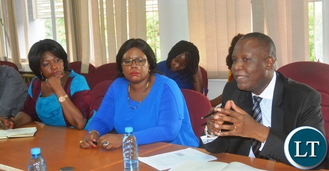 Minister of Finance Felix Mutati(r) flanked with Minister of Agriculture Dora Siliya(c) and Commerce Minster Margaret Mwanakatwe(l) during a Press Briefing at the Ministry of Finance