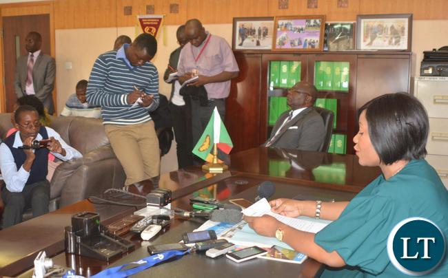 Minister of Information and Broadcasting Services Kampamba Mulenga(l) speaking to the Media on the Implementation of the Digital Migration Project and Establishment of the joint Ventures and the dispel of the insinuation that Government has given ZNBC to a Chinese Company.