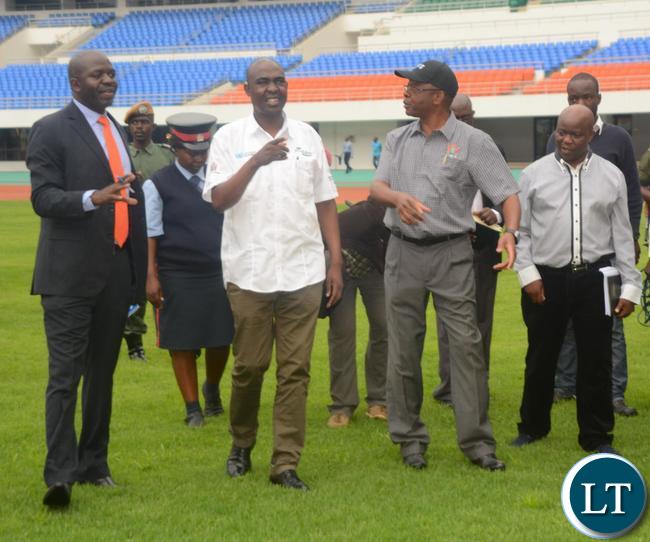 Ministry of Housing and Infrastructure Development Structural Engineer Francis Mundanya(l) explaining to the Minister of Works and Supply Mathew Nkhuwa(c) and Lusaka Province Minister Japhen Mwakalombe(r) the Development of the works during the tour of the Infrastructure at Heroes Stadium Ministry of Housing and Infrastructure Development Structural Engineer Francis Mundanya(l) explaining to the Minister of Works and Supply Mathew Nkhuwa(c) and Lusaka Province Minister Japhen Mwakalombe(r) the Development of the works during the tour of the Infrastructure at Heroes Stadium
